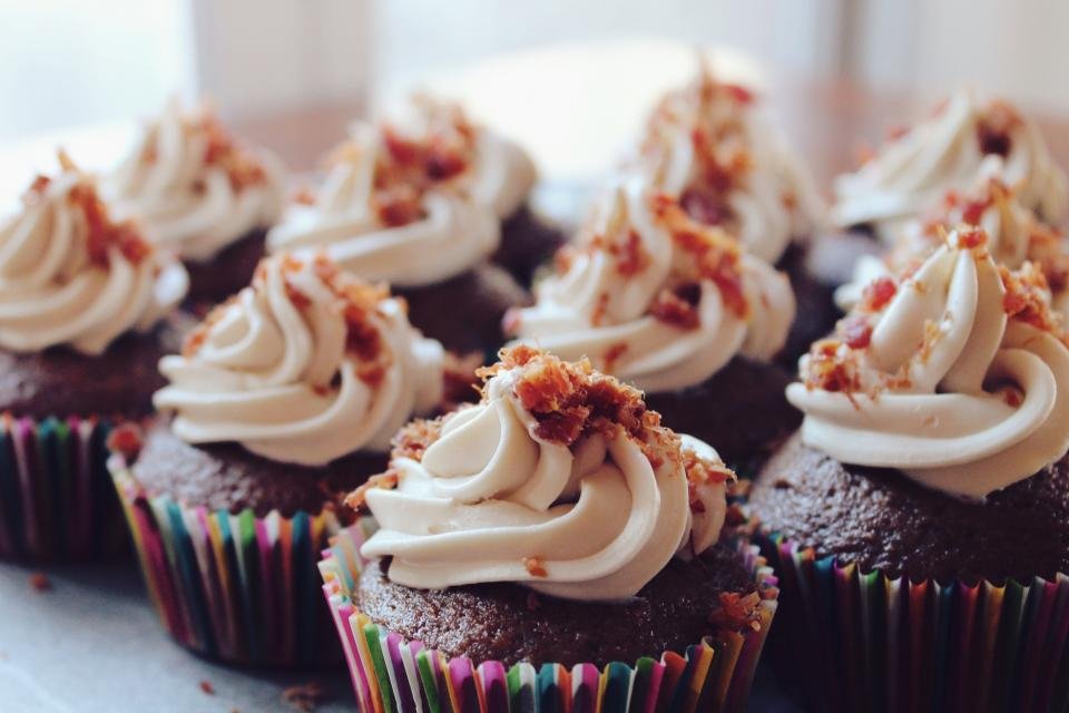 Decorated cupcakes in patterned cupcake cases